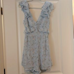 Medium Francesca’s floral romper NEW WITH TAGS